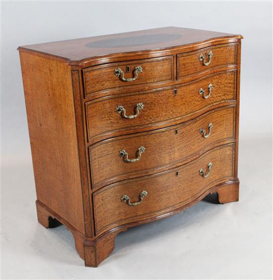 A good George III inlaid satinwood serpentine chest, W.3ft 3in. D.1ft 10in. H.3ft